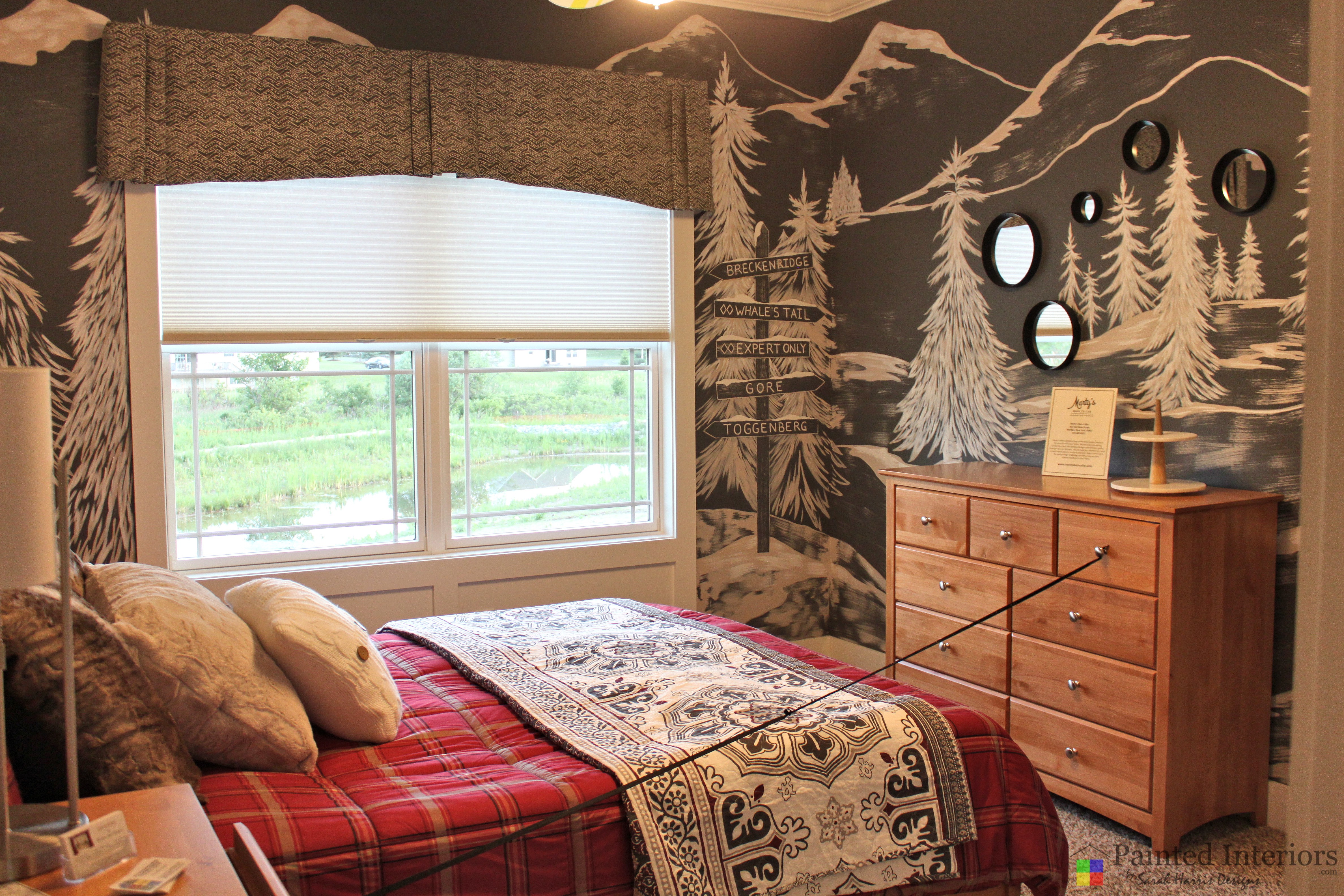 skiing inspired room with hand painted winter scene